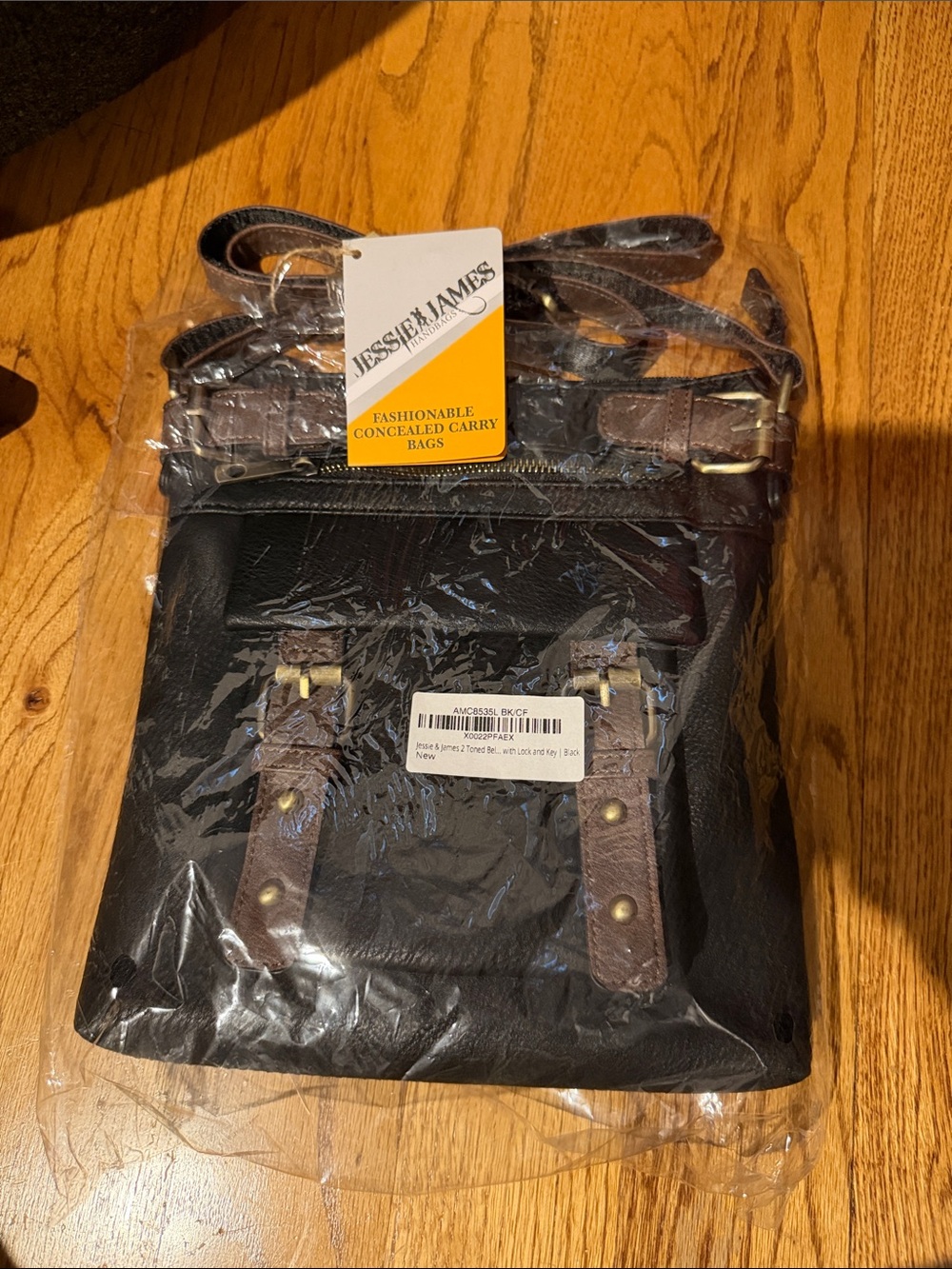 Jessie K. James Black Crossbody Bag with Brown Trim